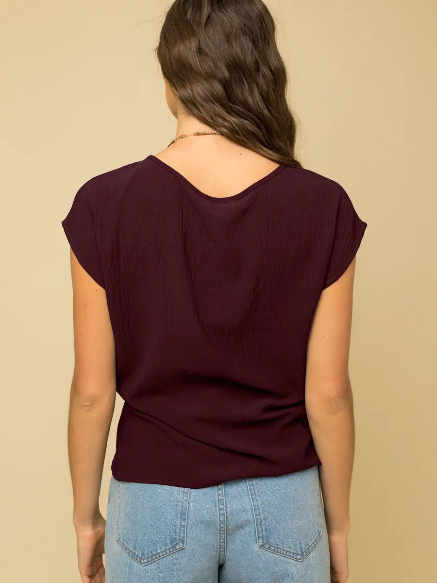 Side Twist Hem Short Sleeve Round Neck Top in Raisin