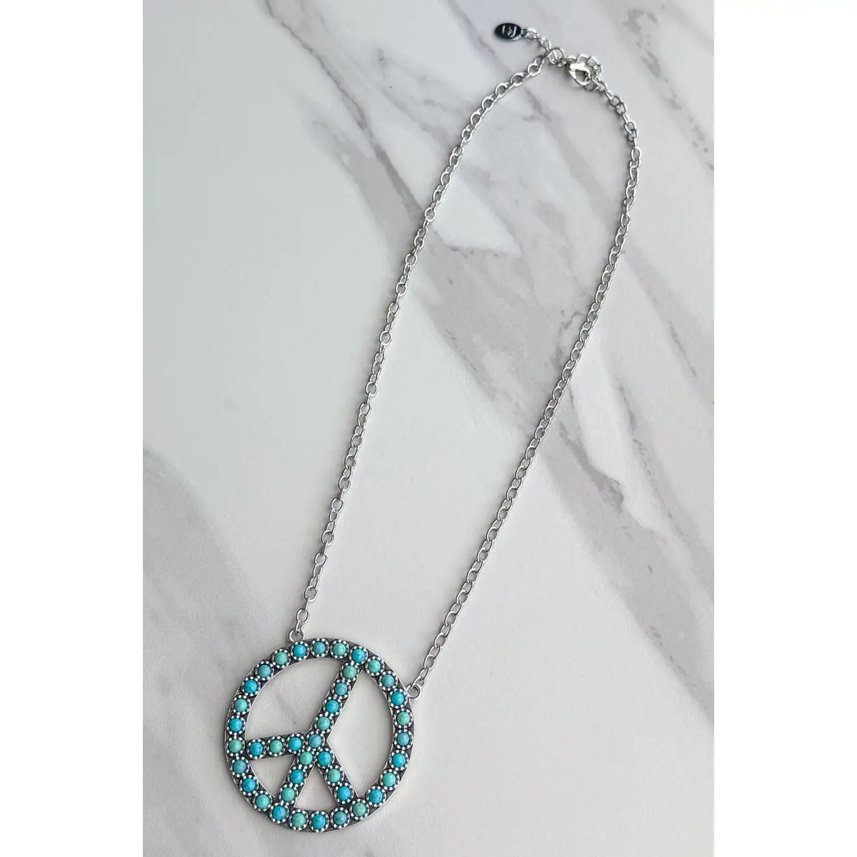 Turquoise Blaze Peace Necklace in Silver