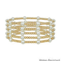 Set of five stacked stretch bracelets featuring alternating pearl beads and smaller beads.