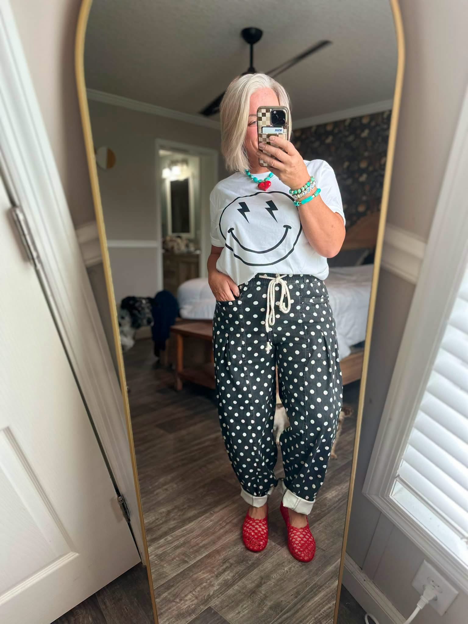Bolt Eyed Happy Face Graphic Top