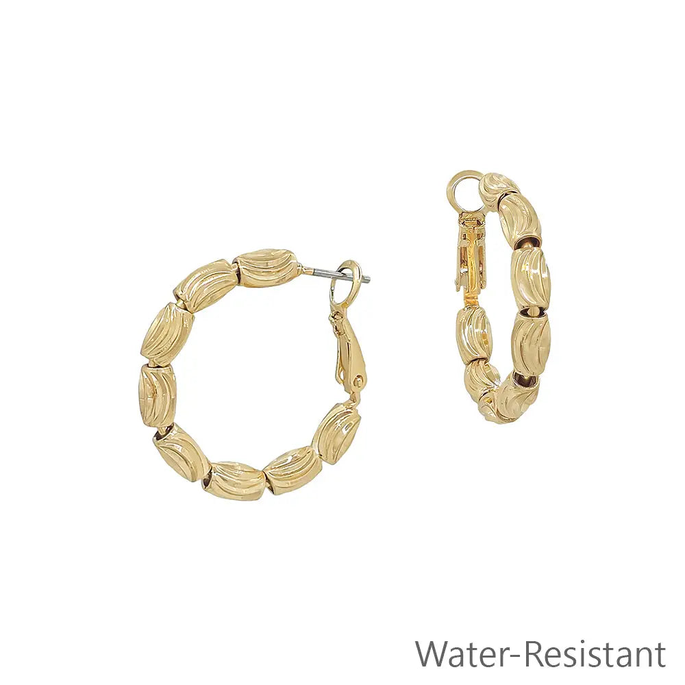 Gold Textured Oval Beads On 1