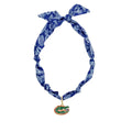 Blue bandana-style scarf with paisley pattern and circular Gators logo pendant, tied in a knot for versatile wear.