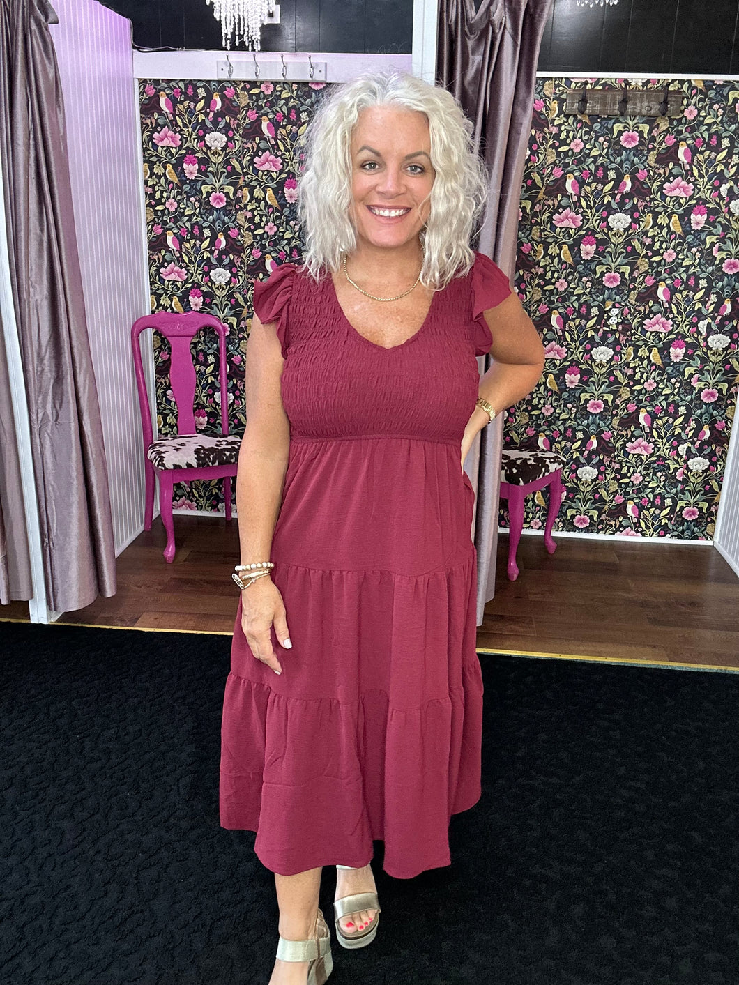 Flutter sleeve smocked dress in burgundy