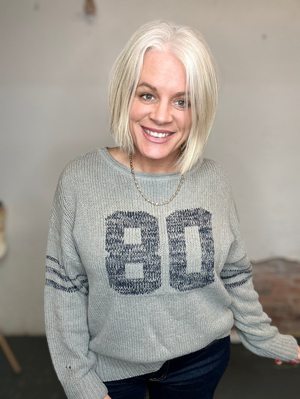 Distressed Long Sleeve Varsity Knit Top