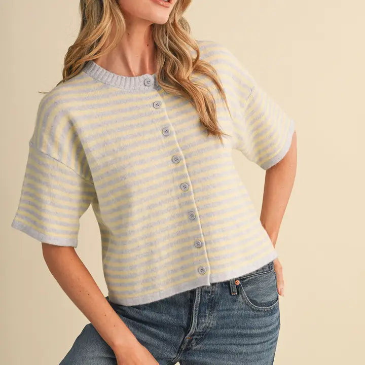 Light blue and yellow striped short sleeve cardigan with ribbed round neckline and button-down placket.